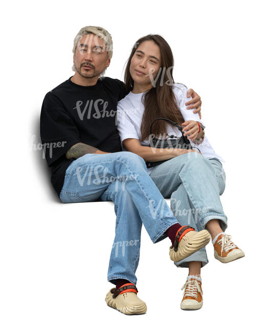 asian man and woman sitting closely together