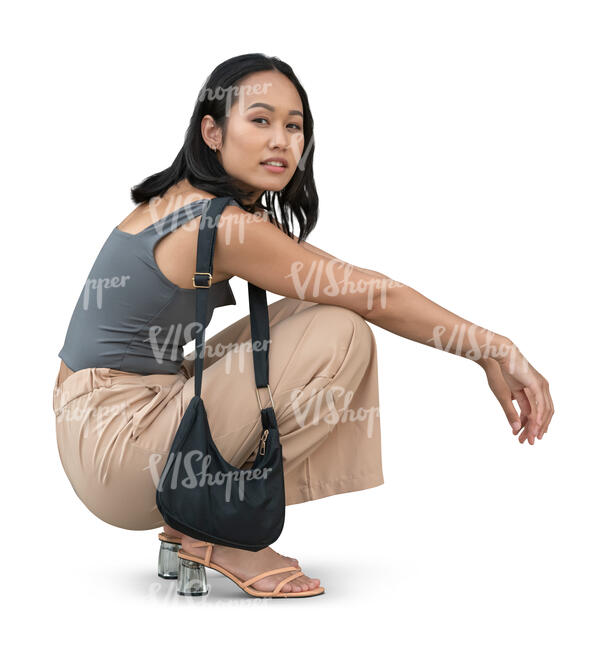 cut out asian woman squatting