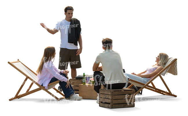 group of young people hanging in a casual cafe outside in the park