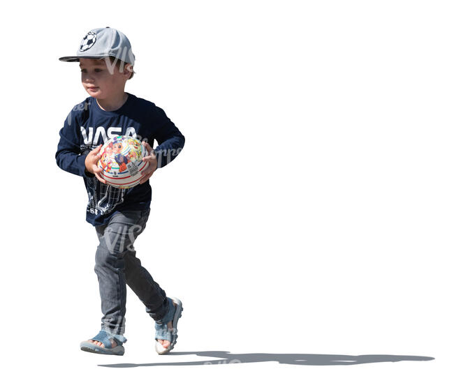 cut out sidelit little boy with a hat running