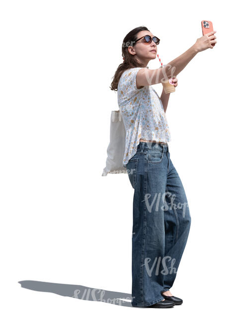 young woman taking a selfie with a coffee drink