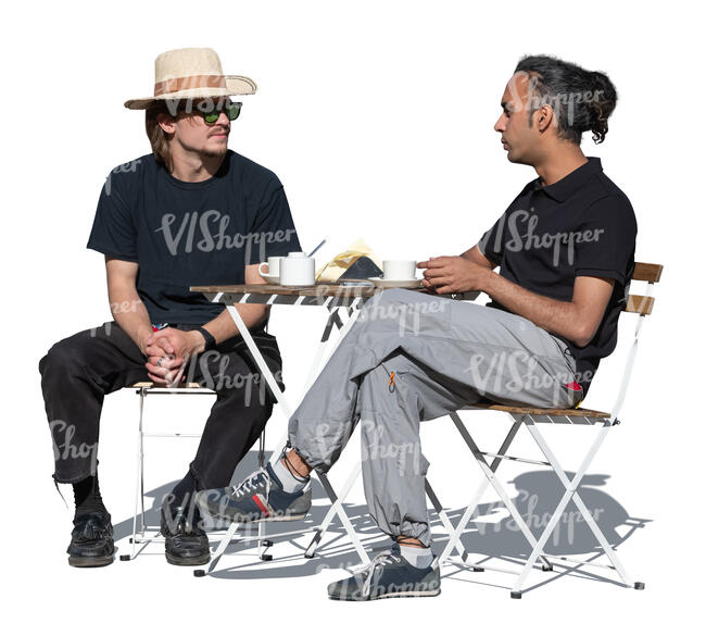 two men sitting in an outdoor cafe and talking