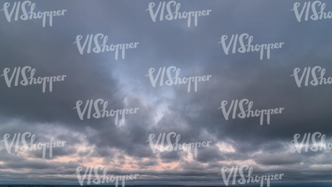 pink sunset with grey clouds