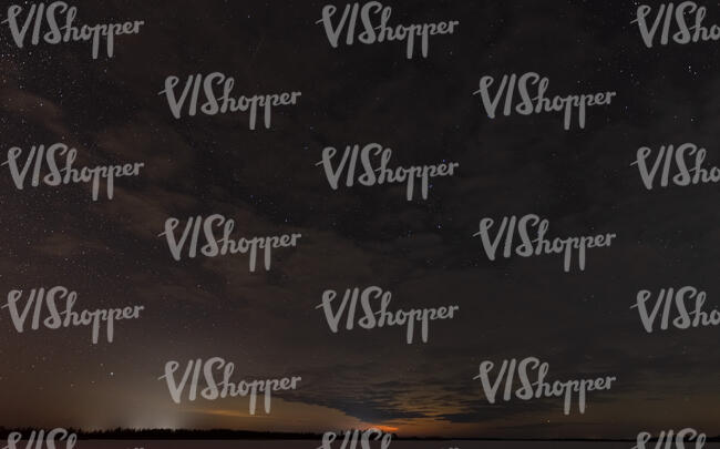 night sky with stars and light clouds